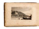 an old book with a picture of a castle on top of a hill
