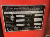 an image of a red machine with a label on it