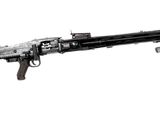 an old machine gun on a stand on a white background
