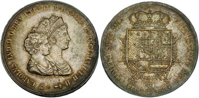 a close up of a coin with a crown on top of it