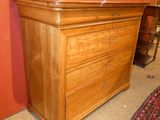 an image of a wooden dresser in a room
