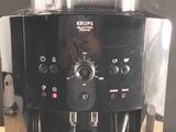 a coffee machine that is sitting on a wooden table