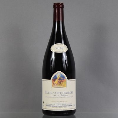 a bottle of wine that is sitting on a table