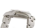 a close up of a watch with a diamond on it