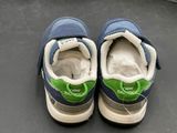 a close up of a pair of shoes on a table