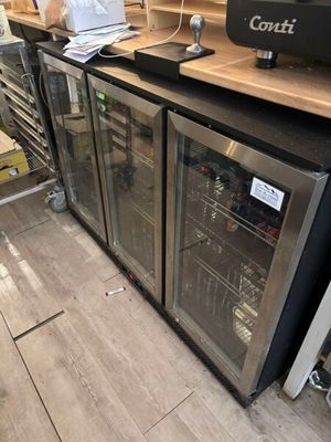 an image of a commercial kitchen with stainless steel appliances