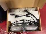 a box with a bunch of wires and cords in it