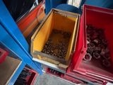 two bins filled with nuts and nuts in the back of a truck