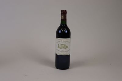 a bottle of wine that is sitting on a table