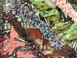 a close up of a quilt with a bunch of flowers on it