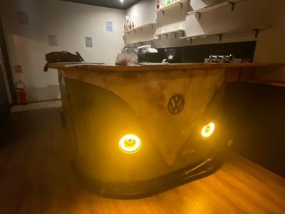 a yellow light that is on the counter in the kitchen
