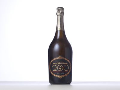 a bottle of wine sitting on top of a table