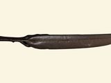 an image of a knife with a leather handle