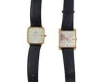 une image représentant deux montres posées l'une sur l'autre