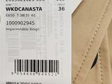 a person holding a ticket with a barcode on it