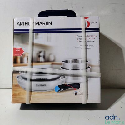 packaging of a boxed set of cookware sitting on a counter