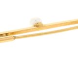 a close up of a pair of hair clips on a white background