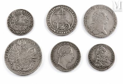 six different types of silver coins are shown on a white surface