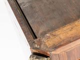 a close up of a piece of wood with a handle on it