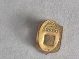 a close up of a small gold plated metal object