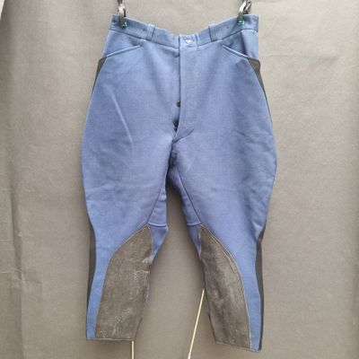 the pants are blue and grey with a brown patch on the side