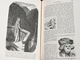 an open book with a picture of a woman and a bear