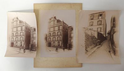 three old photos of buildings are displayed on a white surface