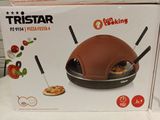 a box with a pizza oven inside of it