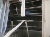 a close up view of the inside of an oven with the door open