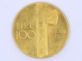 une pièce d'or sur laquelle est représenté un phare