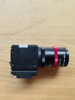 an image of a camera lens on a wooden table
