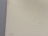 a picture of an open envelope with a stamp on it