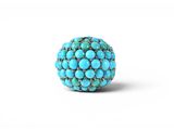 a turquoise beaded ring on a white background