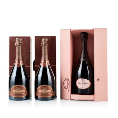 two bottles of champagne in a pink gift box