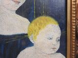 a painting of a woman and a child in a gold frame