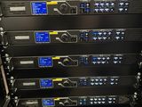 a rack with many different types of electronic equipment in it