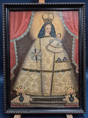 une image d'un tableau représentant une femme tenant un bébé dans ses bras