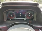 the dashboard of a car with a digital display on it