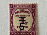 the stamp is purple and white with a black and red design on it
