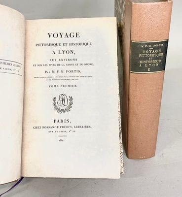 two books that are sitting next to each other on a table