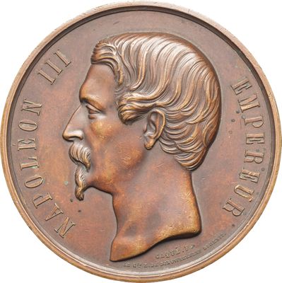 une image représentant une médaille de bronze sur laquelle figure le visage d'un homme
