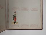 an open book with a picture of a soldier on it