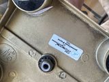 a close up of a camera with a sticker on it
