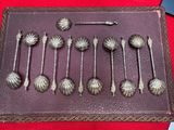 a lot of spoons that are on a table