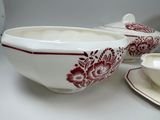 two bowls and a saucer sitting on a table