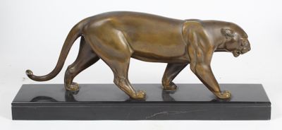 bronze sculpture of a panther on a black marble base