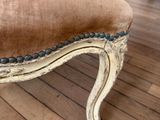 a chair that is on a wooden floor in a room