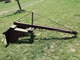 a large metal object that is sitting in the grass