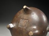an image of a brown vase sitting on top of a table