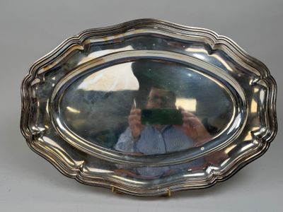 a man taking a picture of himself in a mirror